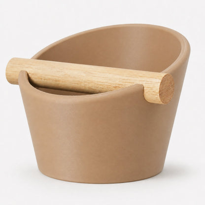 Oval coffee knock box with latte brown finish and real oak wood bar, by KNOCDIC®. Perfect for espresso machine cleanup.