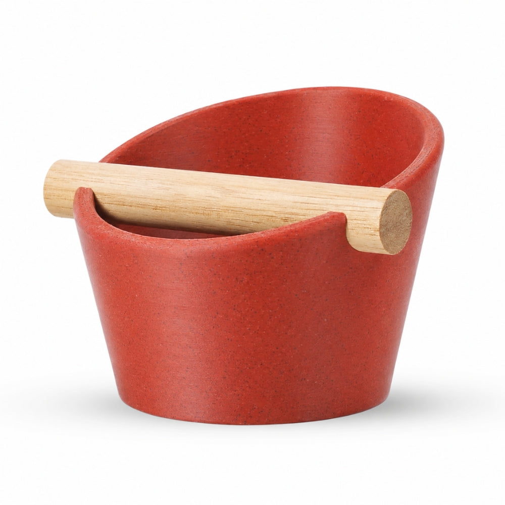 KNOCDIC® oval coffee knock box with marble red finish and real oak wood bar for espresso machine cleanup.