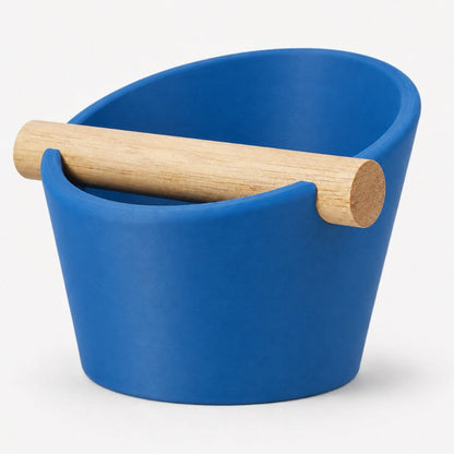 Oval coffee knock box by KNOCDIC® with marine blue finish and real oak wood bar for espresso machine use.
