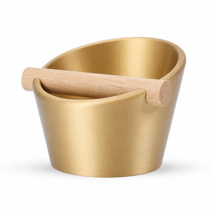 KNOCDIC® oval coffee knock box with metallic gold finish and real oak wood bar for espresso machine use.