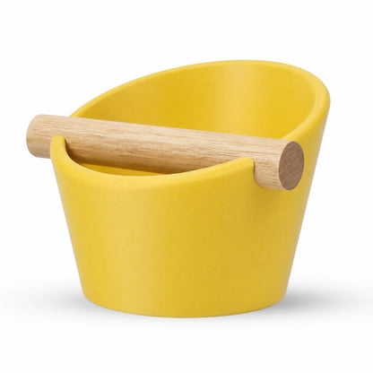 KNOCDIC® oval coffee knock box with yellow finish and real oak wood bar for espresso puck disposal.