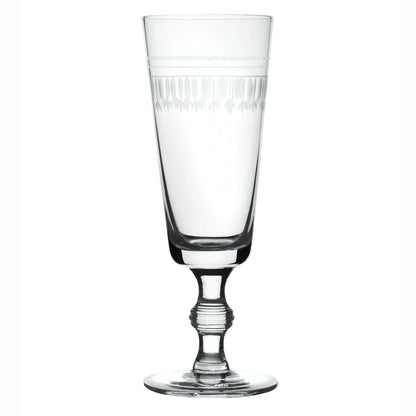 A Set of Four Crystal Champagne Flutes with Ovals Design