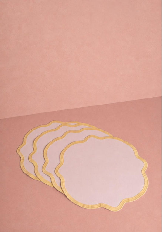 Set of four yellow trim placemats by Casa by Josephine Jenno, showcasing vibrant yellow accents and durable woven design.
