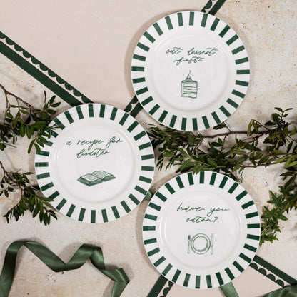 Set of Avalon Home UK Have You Eaten Bone China Plates displayed together, showcasing elegant white dinnerware with a smooth finish.