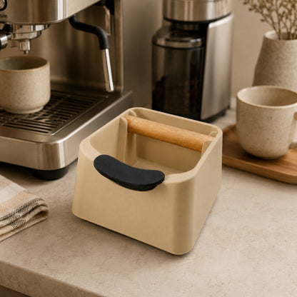 KNOCDIC® Pod Coffee Knock Box with stainless steel drum and wooden base, used for disposing of coffee grounds in a stylish kitchen setting.