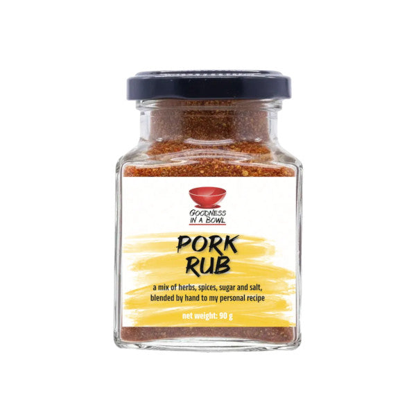 Close-up of GOODNESS IN A BOWL pork rub in a jar, showcasing the seasoned blend of spices for grilling or barbecuing.