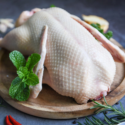 Raw Creedy Carver free-range whole duck from Primrose Herd, showcasing fresh, plucked duck ready for cooking.