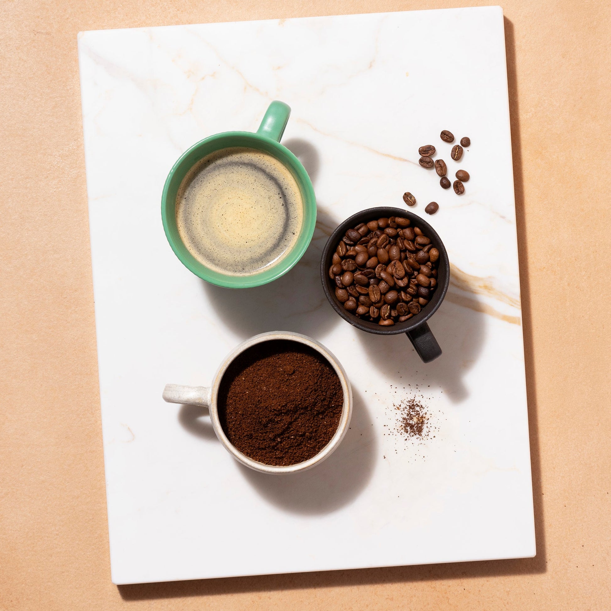 Roasted organic whole coffee beans in a 1kg bag from RawGorilla, featuring glossy brown beans with a rich aroma.