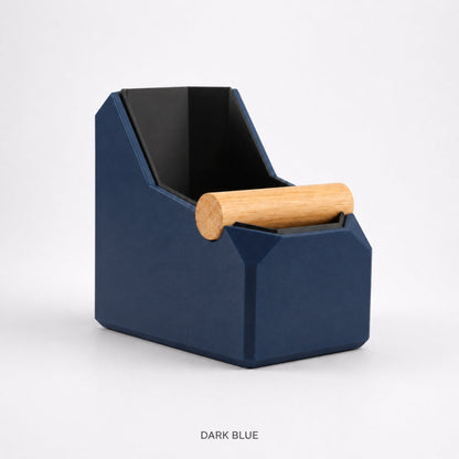Dark blue rectangular coffee knock box with a real oak knock bar for espresso machine portafilter cleanup.