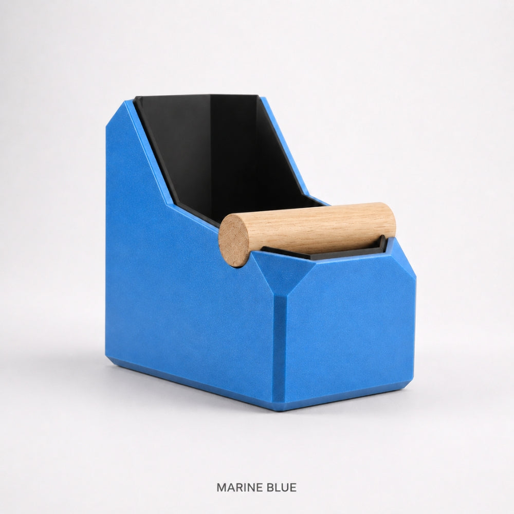 Rectangular marine blue coffee knock box by KNOCDIC® with a real oak knock bar for espresso puck disposal.