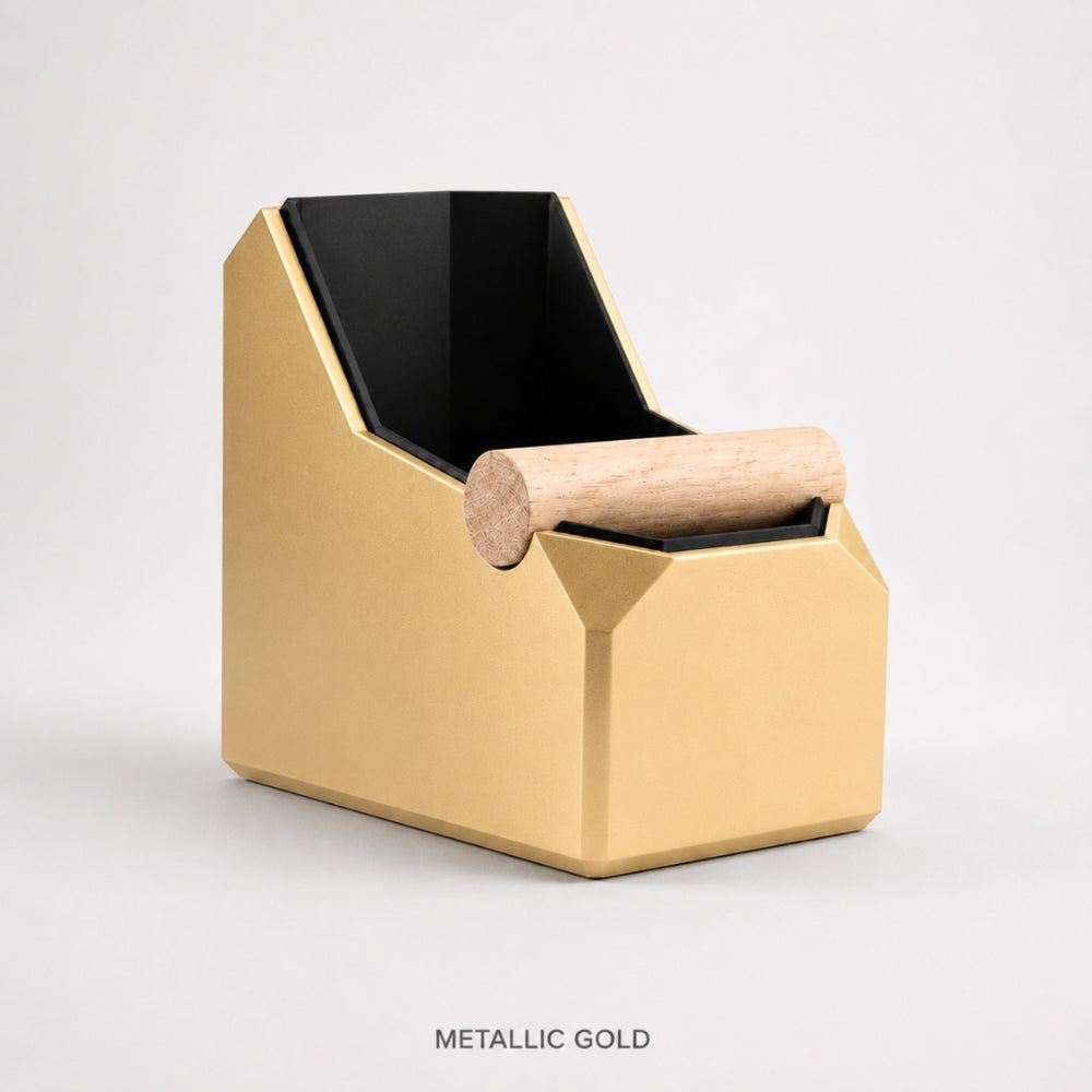 KNOCDIC® rectangular coffee knock box with metallic gold finish and real oak knock bar for espresso puck disposal.