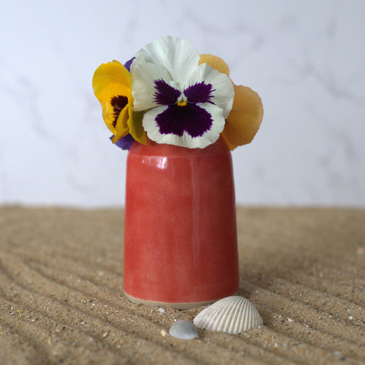 Cherry red classic bud vase by Katie L Thompson Designs, square-shaped glass container for floral arrangements.