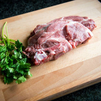 Primrose Herd pork spare rib chops, 500g, showing raw pork chop cuts with bone and marbled meat.