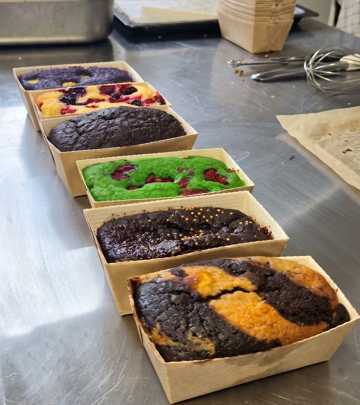 Assorted free from baked goods in the Mixed Box by The Healthy Cake Company, featuring various gluten-free and allergen-free treats.