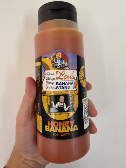 Banana and honey sauce in a jar, Lou's Brews condiments and sauces, with a spoon for serving