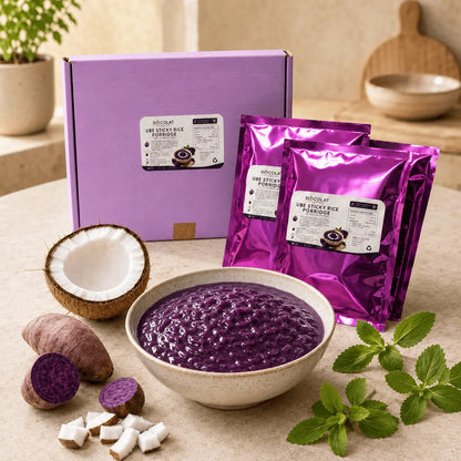 Vegan friendly no added sugar Ube Champorado rice porridge served in a bowl, featuring vibrant purple sticky rice dessert by Siocolat.