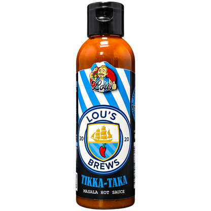 Bottle of Lou's Brews Tikka Taka Masala Hot Sauce with vibrant label and spicy sauce inside, perfect for adding heat to dishes.