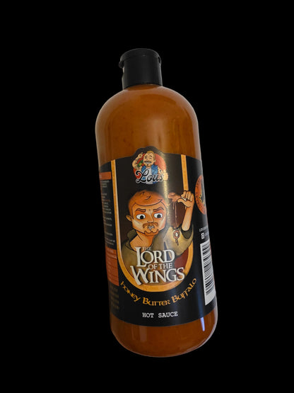 Bottle of Lou's Brews Lord of the Wings Honey Butter Buffalo sauce, showing label and golden sauce inside the condiment bottle.