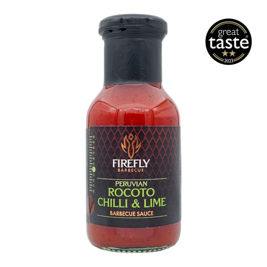 FireFly Barbecue Peruvian Rocoto Sweet Chilli and Lime Sauce in a glass jar, showcasing vibrant red chili and lime ingredients.