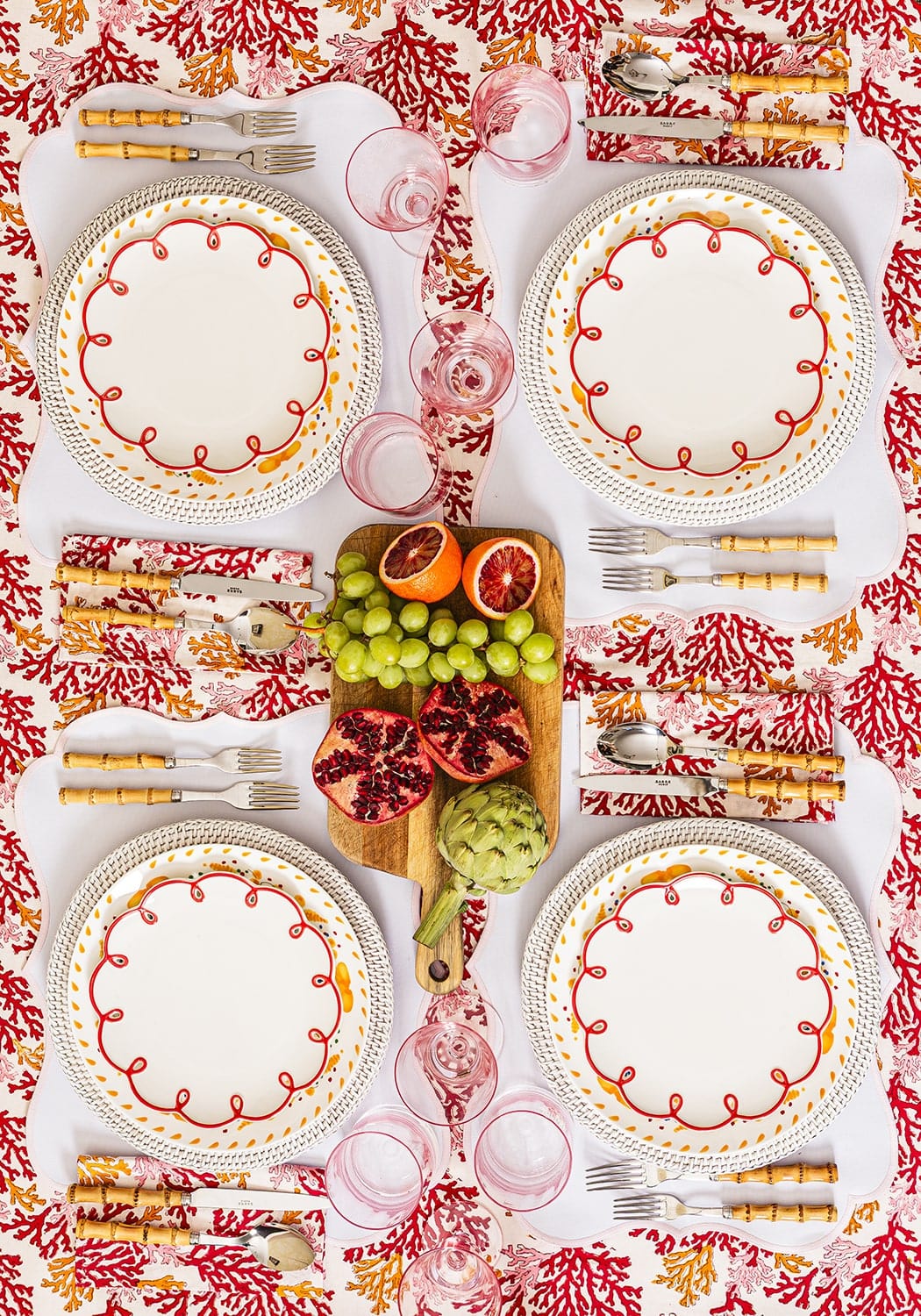 Set of four Casa by Josephine Jenno Rose Coral table napkins with elegant floral design for dining and decor.