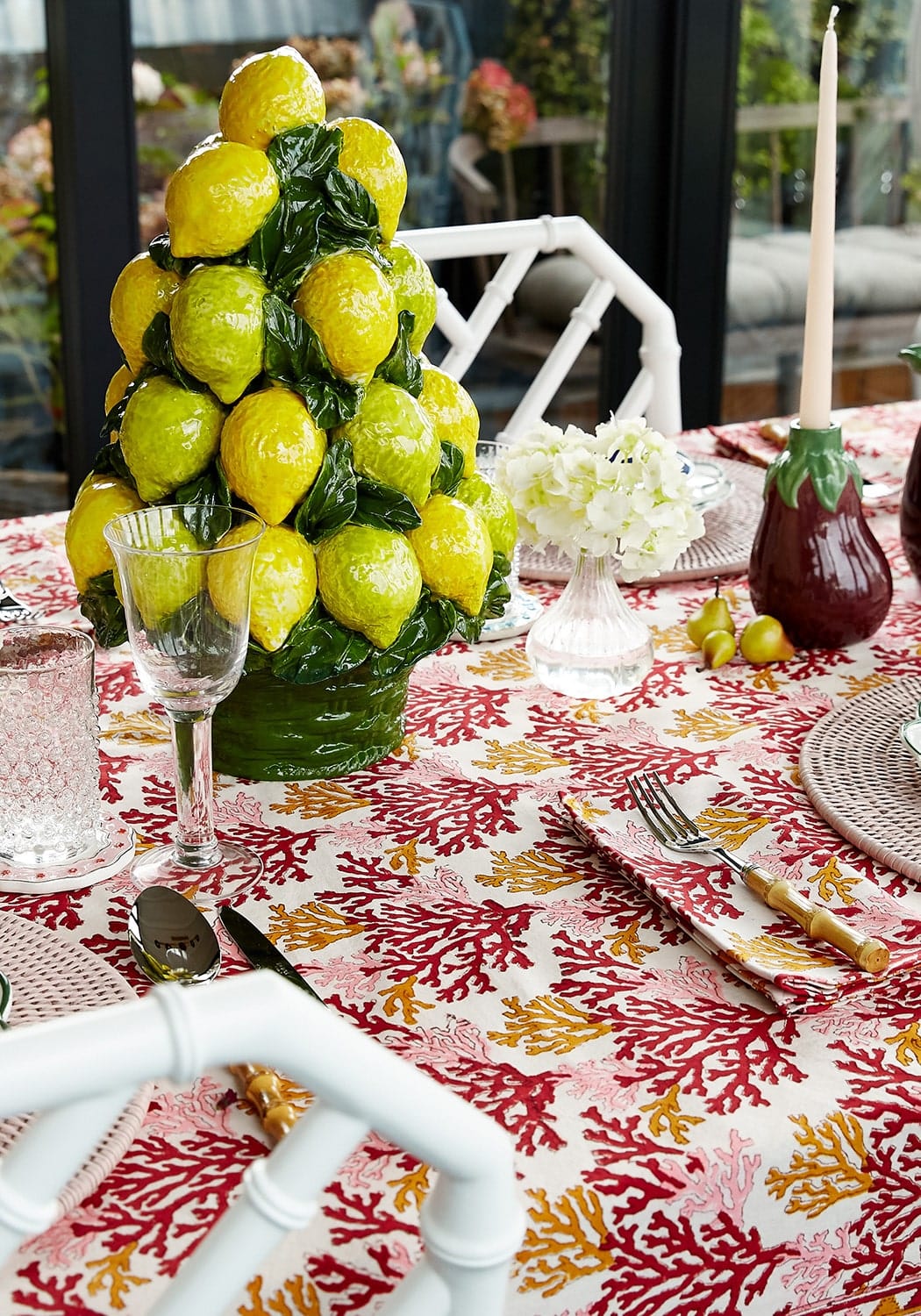 Set of four rose coral fabric table napkins by Casa by Josephine Jenno, featuring elegant, soft-colored cloth for dining decor.