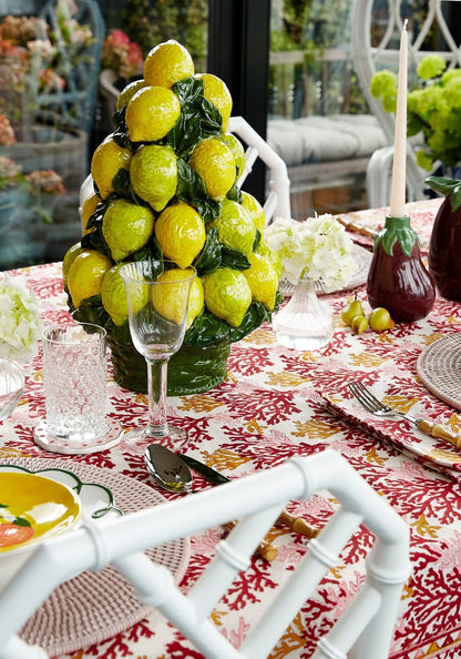 Set of four rose coral fabric table napkins by Casa by Josephine Jenno, featuring elegant fold and stylish design.