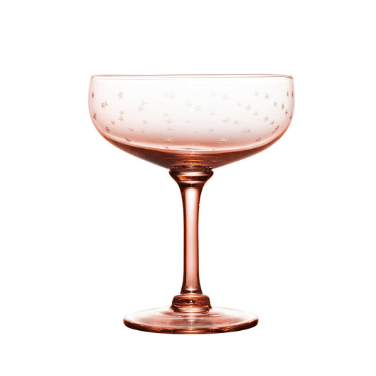 Four rose crystal cocktail glasses with star designs, elegant drinkware by The Vintage List, perfect for stylish cocktails.