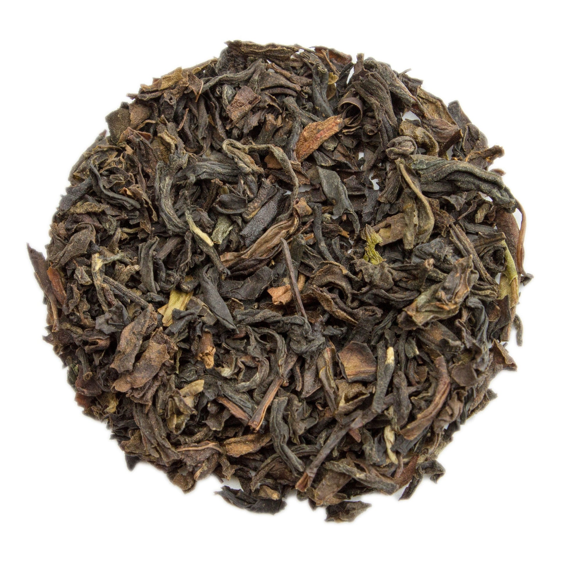 A cup of Russian Caravan tea from PekoeTea Edinburgh, showing a steaming brewed tea with a rich amber color in a white cup.