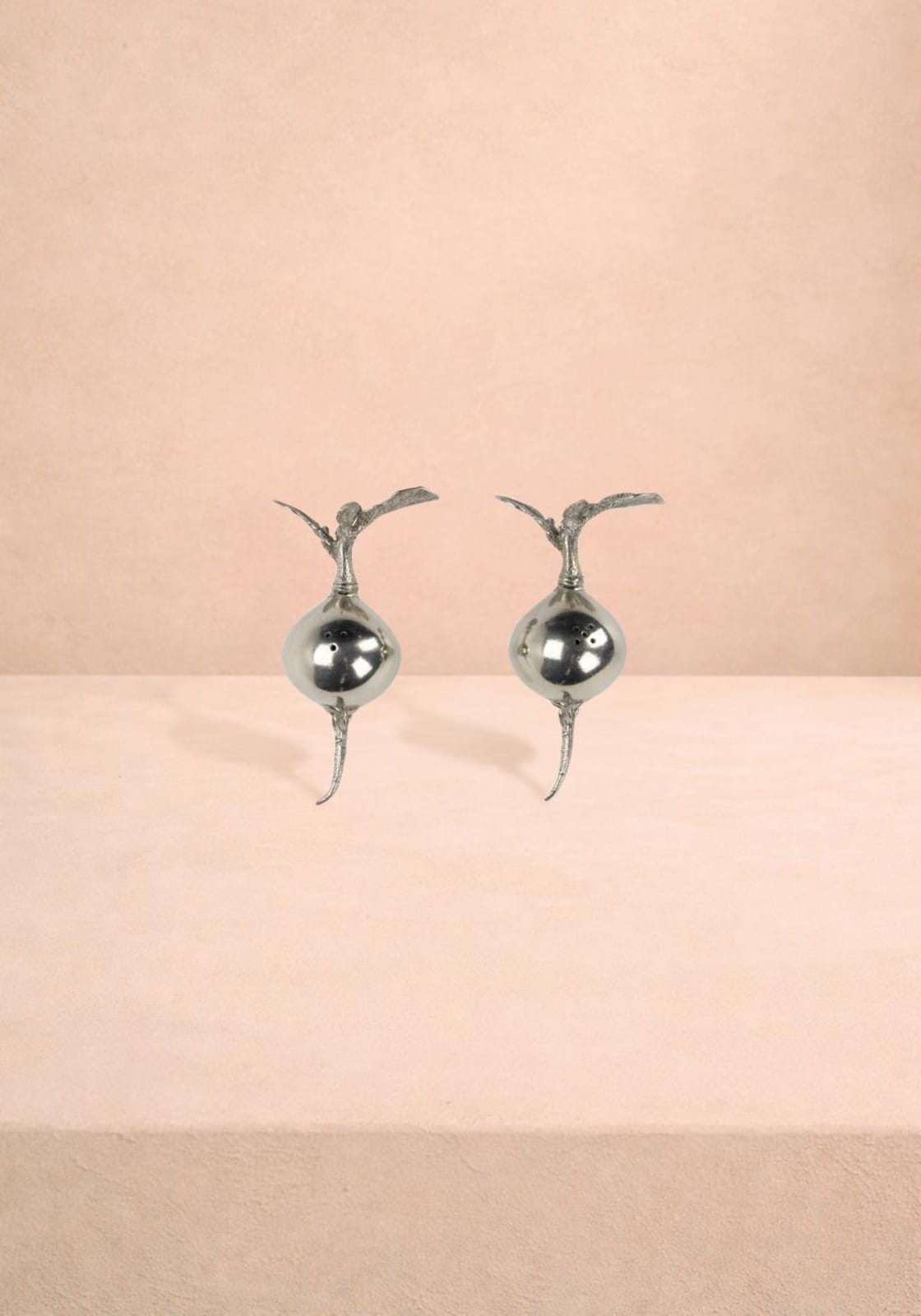 Pair of Casa Garden Harvest Radish Salt and Pepper Shakers featuring colorful radish designs for kitchen or table decor.