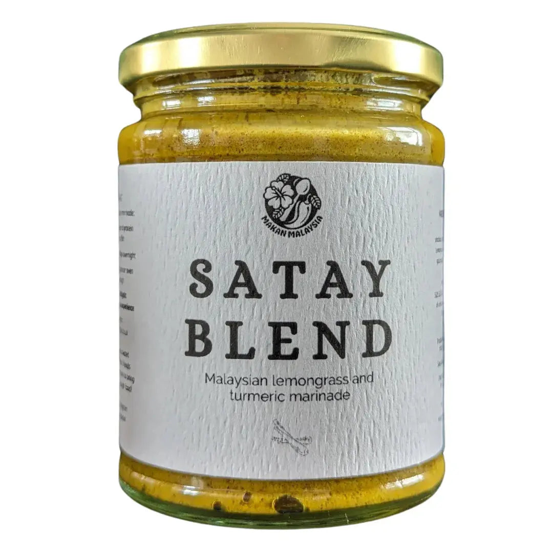 Makan Malaysia Satay Marinade in a jar, with a rich, peanut-based sauce showing a smooth, creamy texture perfect for grilling.