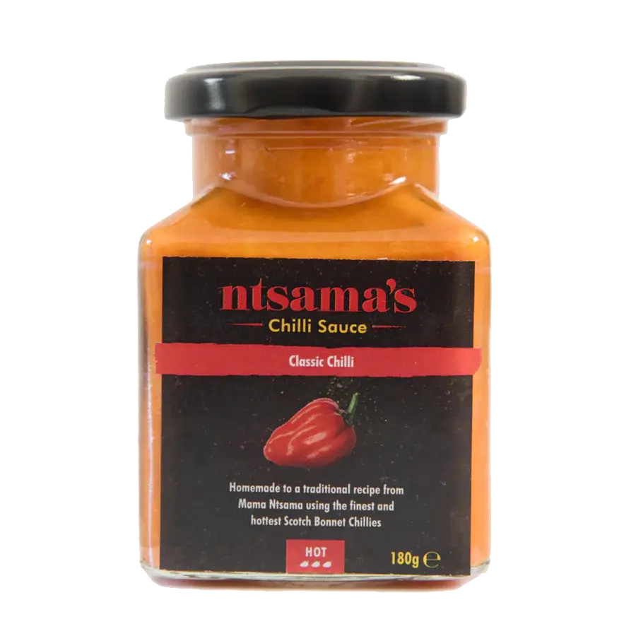 Bottle of ntsama.co.uk Classic Sauce with label visible, showcasing the rich, smooth sauce in a clear glass bottle.