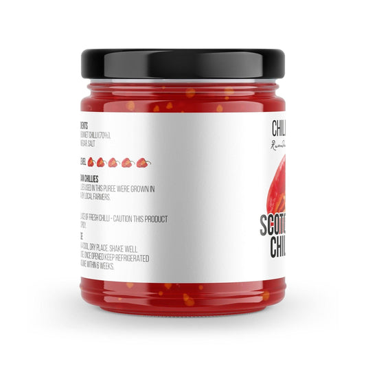 Scotch Bonnet Chilli Puree from Chilli Mash Co., 190g jar, vibrant orange chili mash with visible chili pieces and smooth texture.