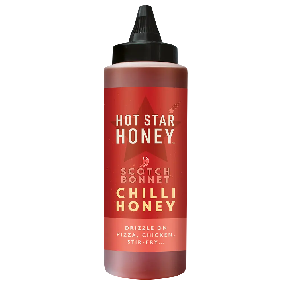 Hot Star Honey Scotch Bonnet Chilli Honey in a clear bottle, showcasing the spicy chili-infused honey product.