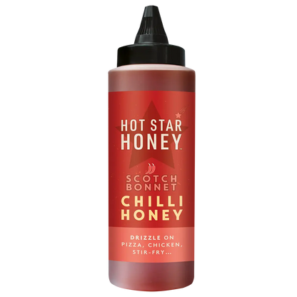 Hot Star Honey Scotch Bonnet Chilli Honey in a clear bottle, showcasing the spicy chili-infused honey product.