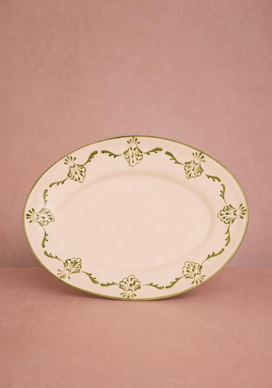 Green Cara Shell serving plate by Casa by Josephine Jenno, a stylish shell-shaped serving piece for appetizers or snacks.