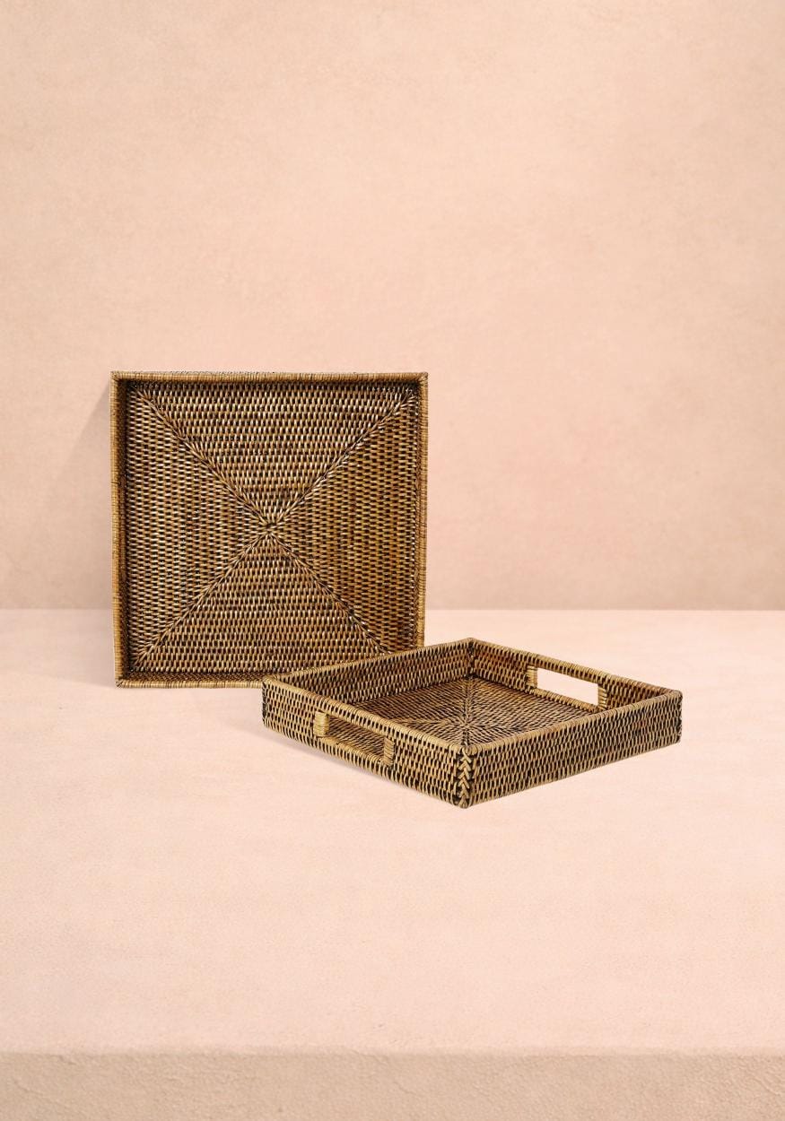 Pair of square rattan serving trays in classic brown with woven design, by Casa by Josephine Jenno.