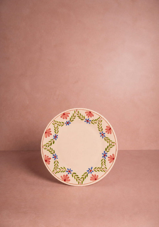 Set of four Casa by Josephine Jenno Camilla side plates with green garland design, elegant ceramic tableware for serving.