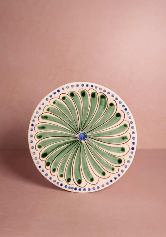 Set of four Casa by Josephine Jenno green peacock side plates with intricate feather designs, perfect for elegant table settings.
