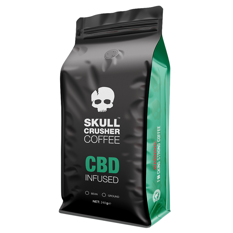 Skull Crusher Coffee infused coffee with skull-shaped packaging and bold branding, showcasing the product's distinctive design.