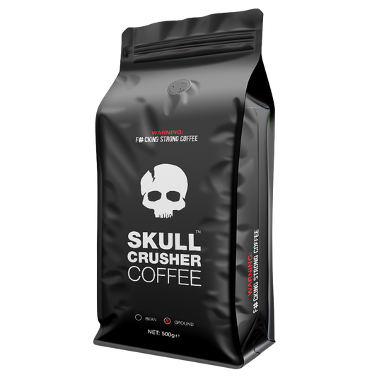 Ground Skull Crusher Coffee beans, high caffeine blend in a bag, ready for brewing a strong, energizing coffee.