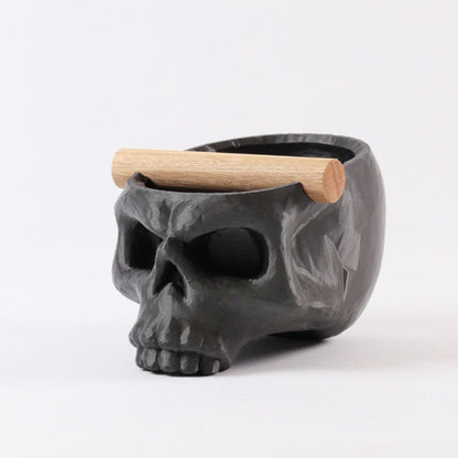 Metallic black Gothic skull espresso knock box with oak bar from KNOCDIC®, featuring a detailed skull design for coffee enthusiasts.