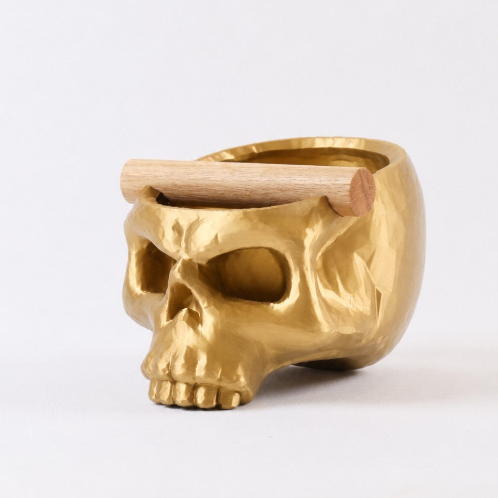 Gothic skull espresso knock box with metallic gold finish and oak bar, stylish coffee accessory by KNOCDIC®.