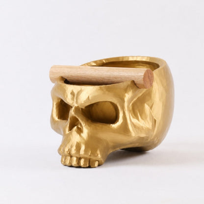 Gothic skull espresso knock box with metallic gold finish and oak bar, stylish coffee accessory by KNOCDIC®.