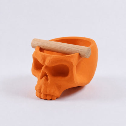 Gothic skull espresso knock box with orange finish and oak bar by KNOCDIC®, featuring a skull-shaped design for coffee enthusiasts.