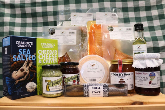 Smoked trout Christmas party bundle from Butler Country Estates, featuring smoked trout fillets and festive packaging for online order.