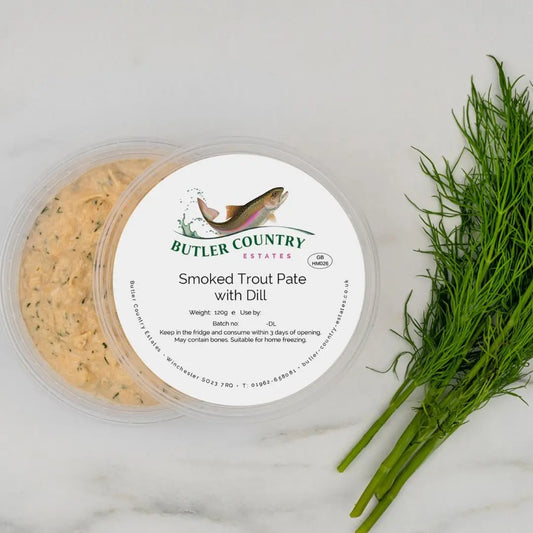 Creamy smoked trout pate with dill on a serving dish, ready for online order from Butler Country Estates.