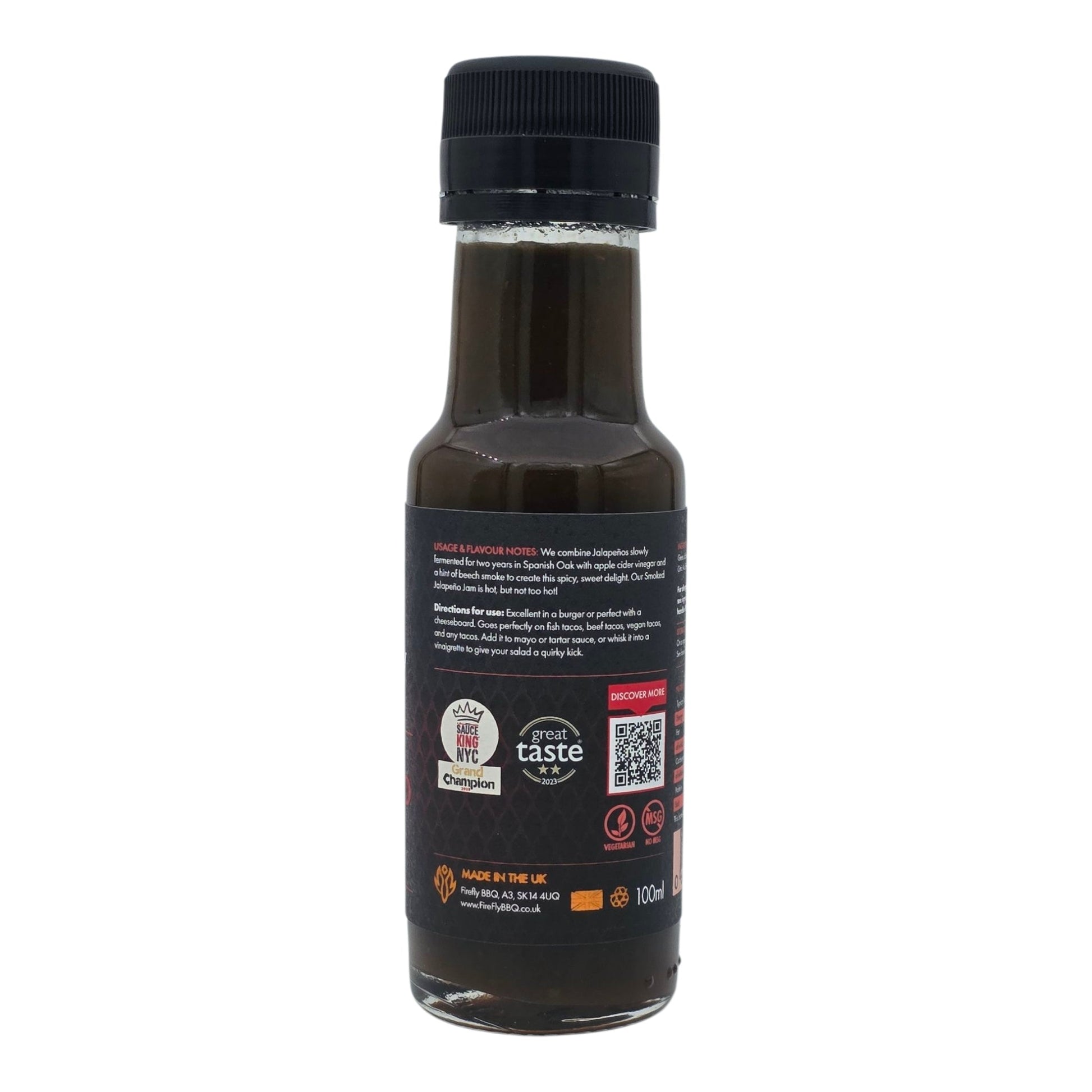 FireFly Barbecue Smoked Jalapeño Jam hot sauce in a jar, showcasing its smoky jalapeño flavor and vibrant orange color.