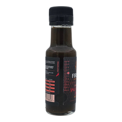 Smoked Jalapeño Jam hot sauce by FireFly Barbecue in a glass jar with a spicy, smoky jalapeño spread.