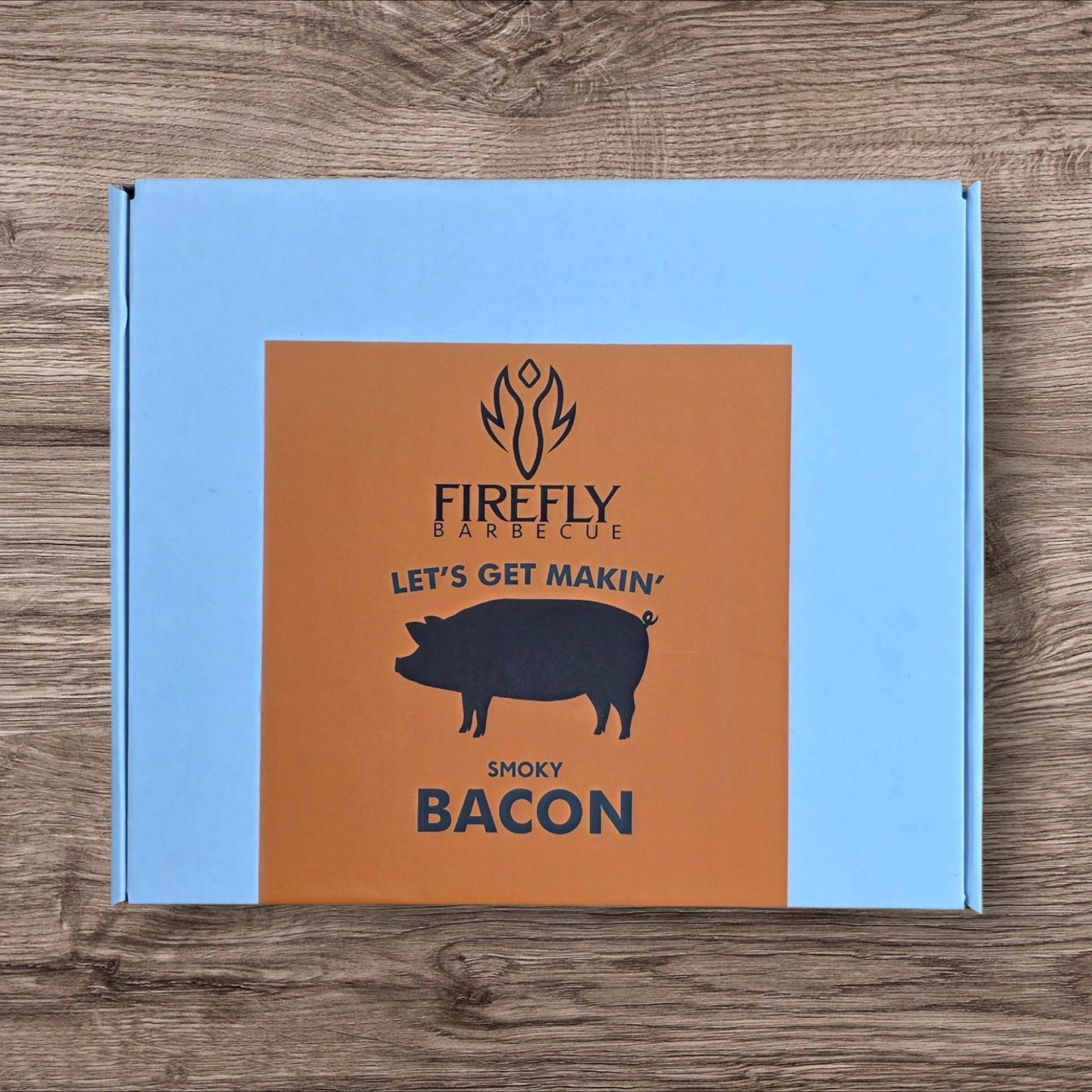 FireFly Barbecue bacon curing kit for homemade hickory smoked bacon, includes curing salts and instructions in a compact kit.