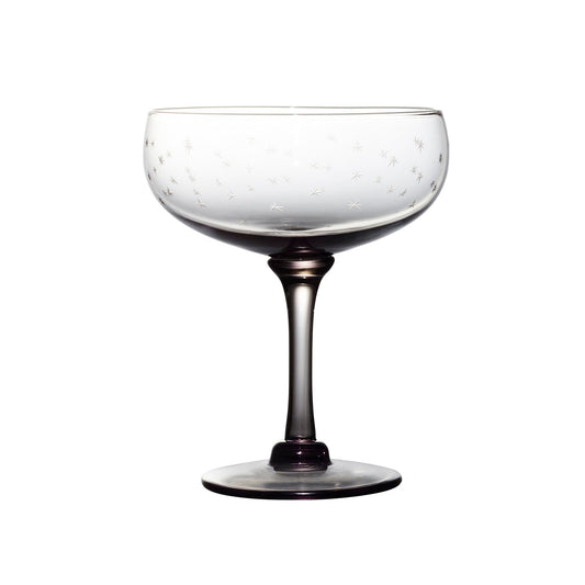 Four smoky crystal cocktail glasses with star designs by The Vintage List, featuring a sleek, elegant style for drinks.